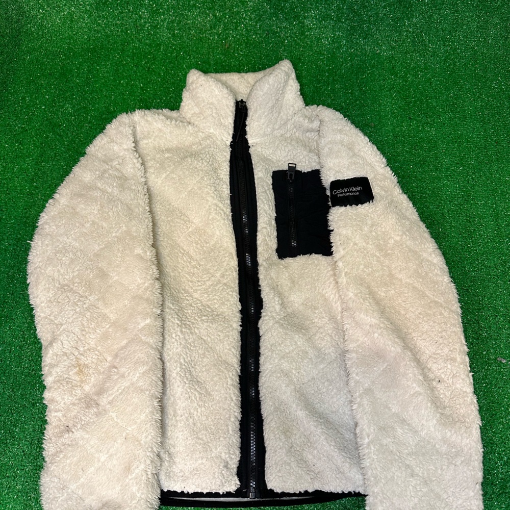 This is a very fuzzy Calvin Klein performance hoodie!